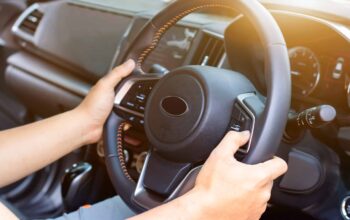 Auto mechanic or driver checks steering and gear system and star Auto mechanic or driver checks steering and gear system and start system before driving at service station,change and repair before drive